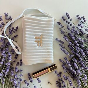 Tom Ford Lip color with White Quilted Wristlet with TF Gold Accent.